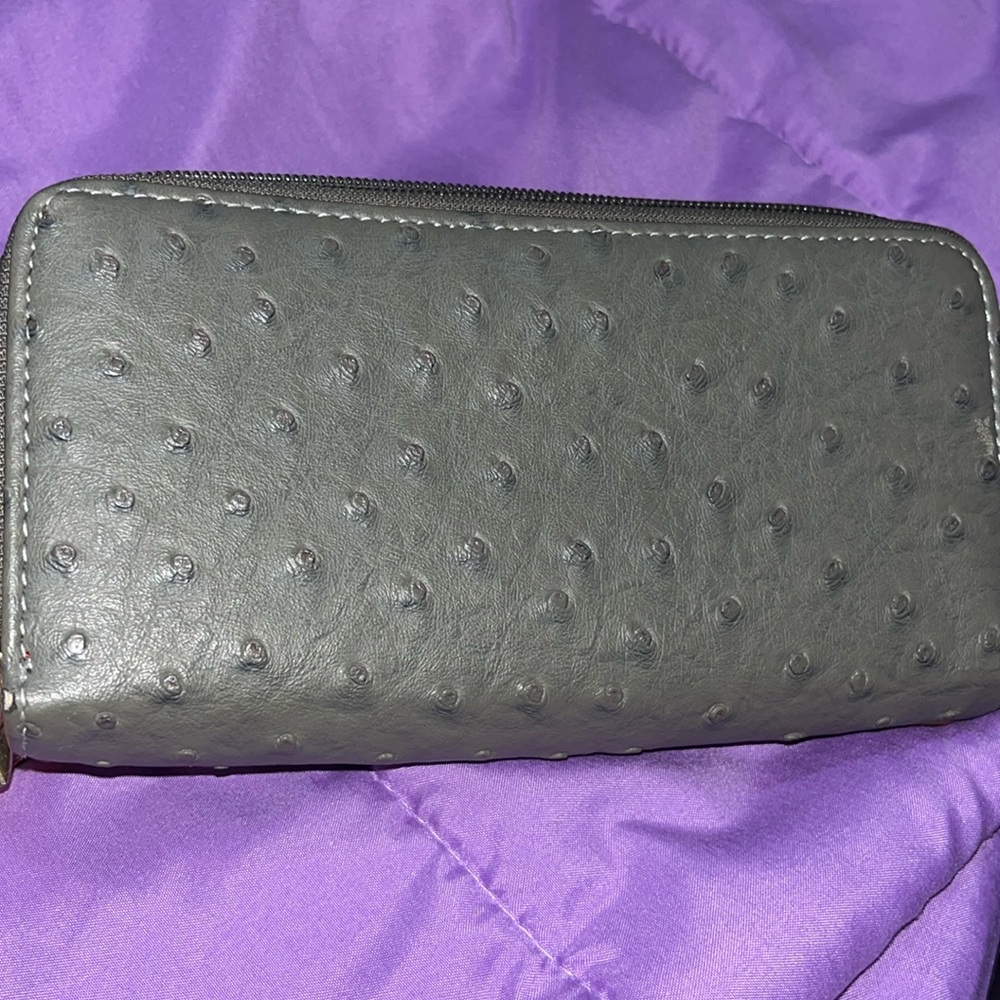 Grey wallet with red inside